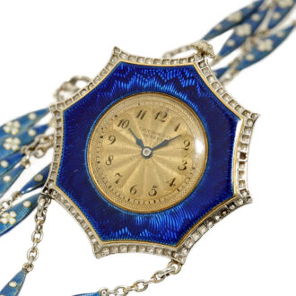 Swiss thin diamond-set gold/platinum pendant watch Circa 1910