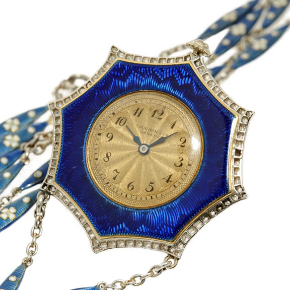 Swiss thin diamond-set gold/platinum pendant watch Circa 1910