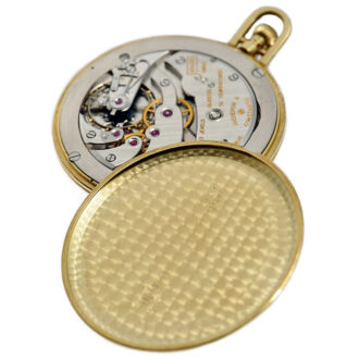 Swiss thin 18K gold open-faced lever pocket watch Circa 1950