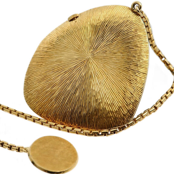 Extra thin Swiss 18K gold asymmetrical fob watch Circa 1965 Extra thin Swiss 18K gold asymmetrical fob watch Circa 1965
