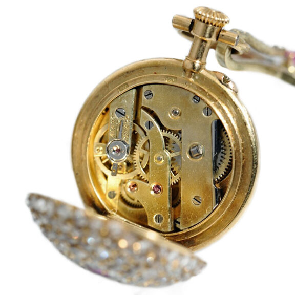 Swiss diamond and ruby studded miniature fob watch Circa 1900 Swiss diamond and ruby studded miniature fob watch Circa 1900