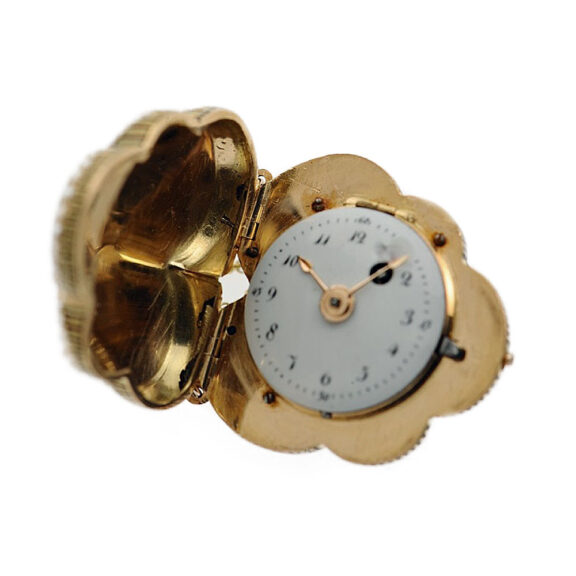 French gold enamel watch in the shape of a tufted pansy Circa 1820 French gold enamel watch in the shape of a tufted pansy Circa 1820