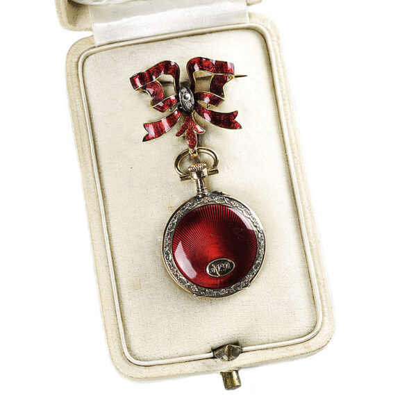 French pendant watch with matching bow brooch Circa 1900 French pendant watch with matching bow brooch Circa 1900