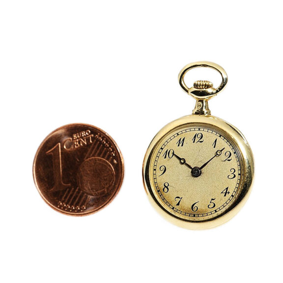 Swiss 18k gold miniature lady's pocket watch Circa 1905 Swiss 18k gold miniature lady's pocket watch Circa 1905