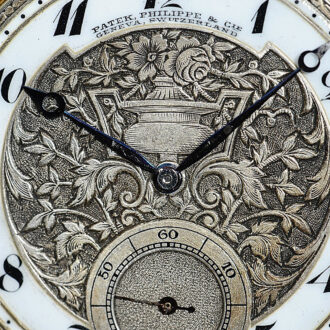 Swiss gold pocket watch with relief engraving silver dial Circa 1910 Swiss gold pocket watch with relief engraving silver dial Circa 1910