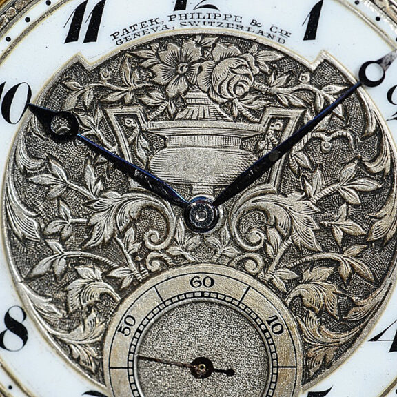 Swiss gold pocket watch with relief engraving silver dial Circa 1910 Swiss gold pocket watch with relief engraving silver dial Circa 1910