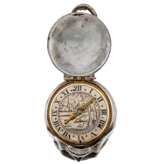 French silver skull form verge with concealed dial Circa 1660 French silver skull form verge with concealed dial Circa 1660