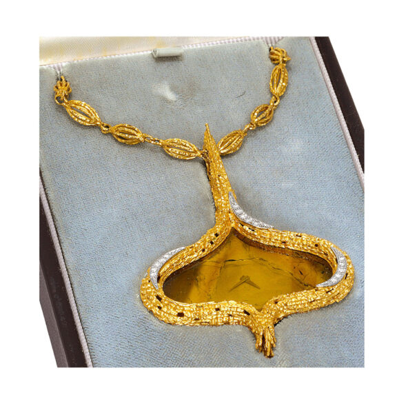 Swiss gold, tourmaline, diamond set pendant watch Circa 1971 Swiss gold, tourmaline, diamond set pendant watch Circa 1971