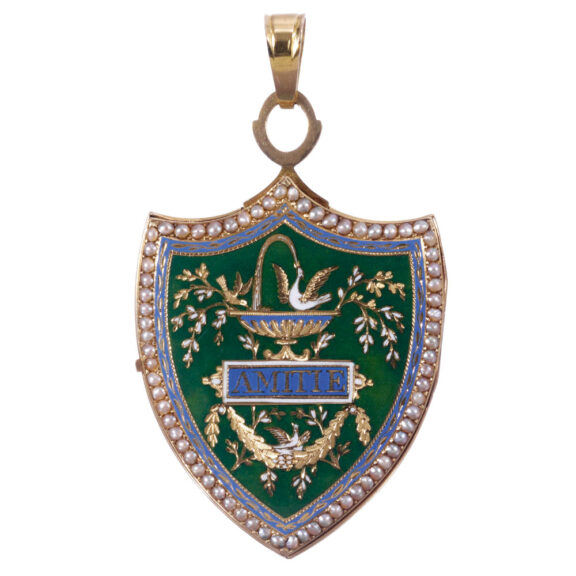 Swiss gold shield shaped watch with visible balance Circa 1800 Swiss gold shield shaped watch with visible balance Circa 1800