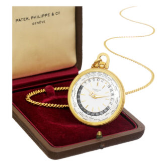 Swiss 18K gold World Time dress watch with chain Circa 1964