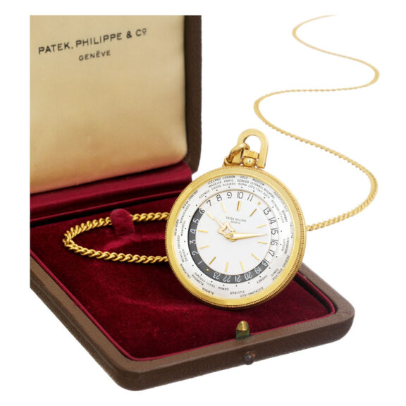 Swiss 18K gold World Time dress watch with chain Circa 1964