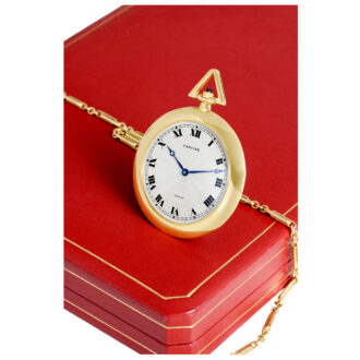 French gold lever with 18K gold Cartier long chain Circa 1985