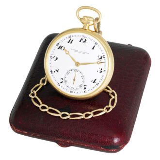 Elegant Swiss gold lever dress watch with long chain Circa 1920