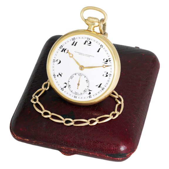 Elegant Swiss gold lever dress watch with long chain Circa 1920 Elegant Swiss gold lever dress watch with long chain Circa 1920
