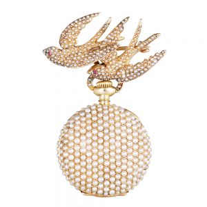 Swiss gold and pearl-set pendant watch with brooch Circa 1900