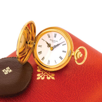 Swiss gold and champlevé enamel pendant watch Circa 1981