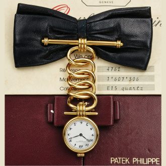 Swiss 18K gold and leather brooch-lapel watch Circa 1989
