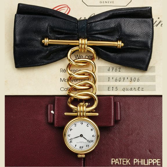 Swiss 18K gold and leather brooch-lapel watch Circa 1989