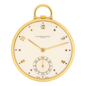 Elegant Swiss 18K gold open faced lever dress watch Circa 1955