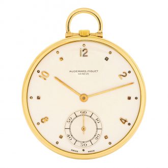 Elegant Swiss 18K gold open faced lever dress watch Circa 1955