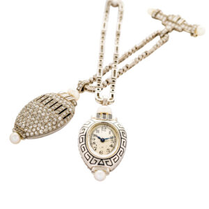 Swiss platinum, diamond and pearl-set Art Deco lapel watch Circa 1926