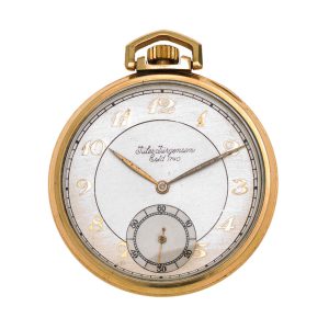 A Swiss 14 carat gold open face lever pocket watch Circa 1930