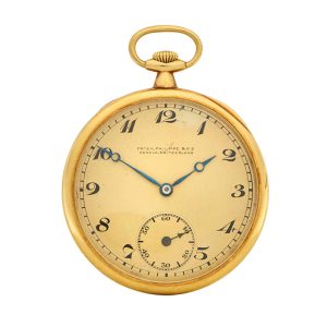 A fine Swiss gold open face dress watch with chain Circa 1920