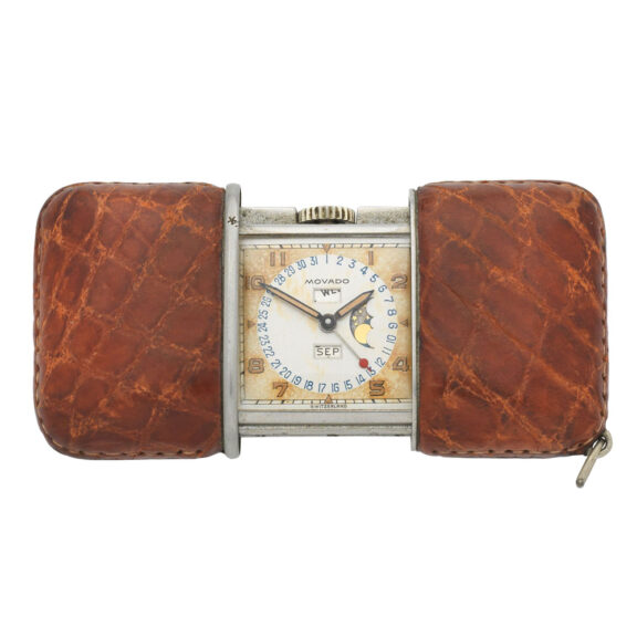 Swiss purse watch with triple calendar and moon phases Circa 1950