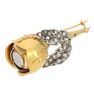Gold and diamond-set rose-shaped Boule de Genève Circa 1890 Gold and diamond-set rose-shaped Boule de Genève Circa 1890