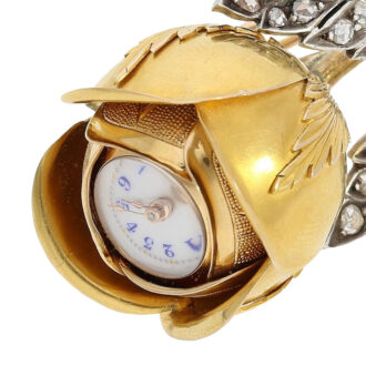 Gold and diamond-set rose-shaped Boule de Genève Circa 1890 Gold and diamond-set rose-shaped Boule de Genève Circa 1890