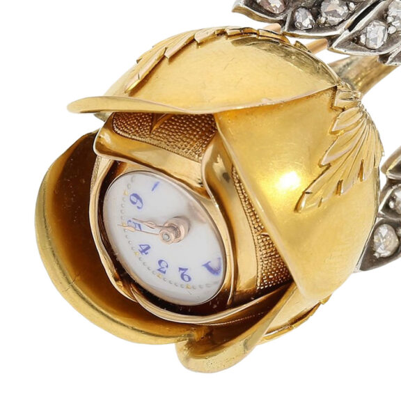 Gold and diamond-set rose-shaped Boule de Genève Circa 1890 Gold and diamond-set rose-shaped Boule de Genève Circa 1890