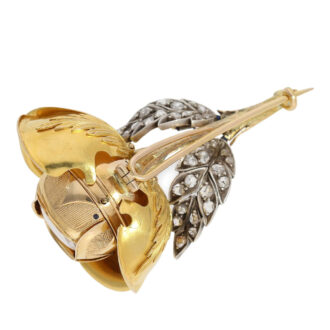 Gold and diamond-set rose-shaped Boule de Genève Circa 1890 Gold and diamond-set rose-shaped Boule de Genève Circa 1890