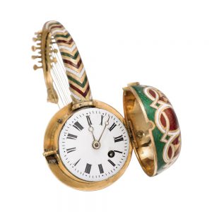 Swiss 18 carat gold and enamel nanga form watch Circa 1820