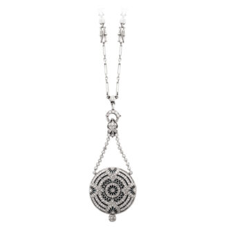 Delicate Swiss decorated miniature pendant watch Circa 1910