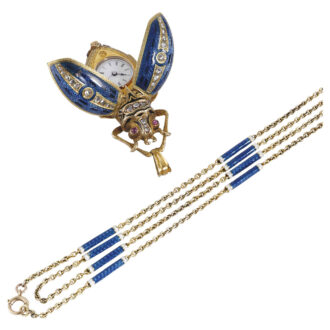 Swiss gold, enamel, diamond, ruby set form watch Circa 1890