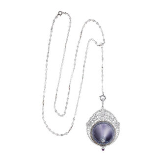 Swiss gold, platinum, diamond set pendant watch Circa 1911