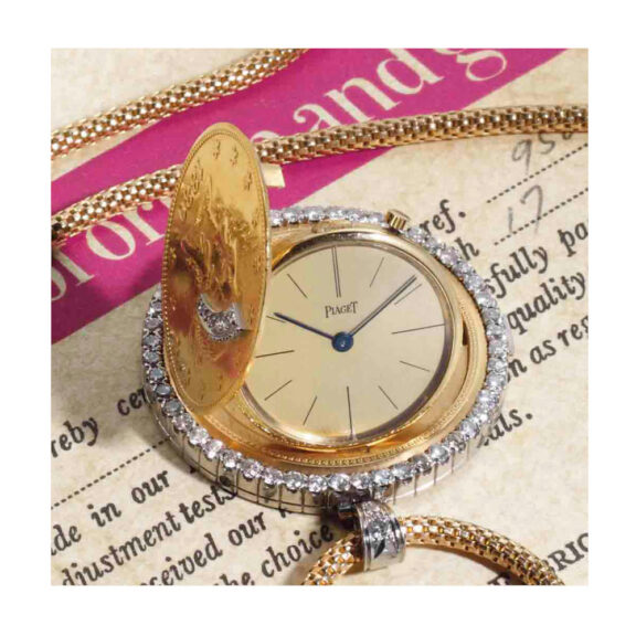 Swiss gold, platinum and diamond set coin watch Circa 1970