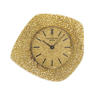 Swiss gold open faced asymmetrical dress watch Circa 1964