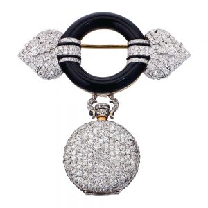 Swiss gold, onyx, diamond set lever pendant watch Circa 1925