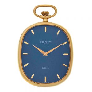 Fine 18k gold open faced oval shaped dress watch Circa 1976