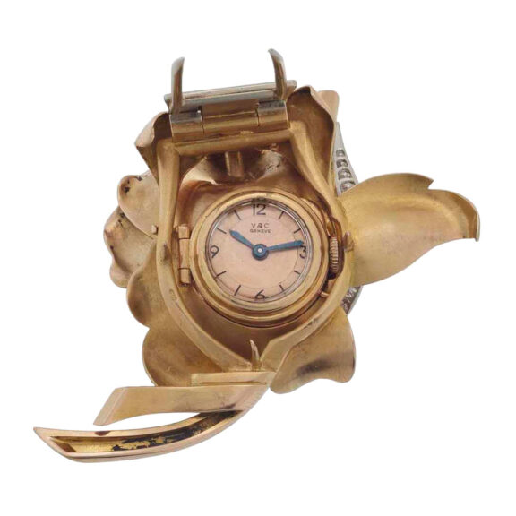 Swiss 18k rose gold and diamond set flower brooch Circa 1941 Swiss 18k rose gold and diamond set flower brooch Circa 1941