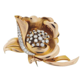 Swiss 18k rose gold and diamond set flower brooch Circa 1941