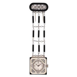 Platinum, gold, onyx, diamond set pendant watch Circa 1930