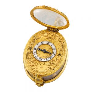 Early gilt metal and rock crystal oval pendant watch Circa 1650