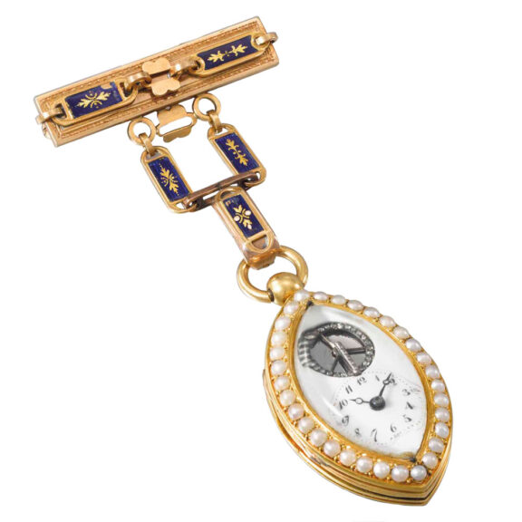 Very fine decorated oval shaped watch with brooch Circa 1850 Very fine decorated oval shaped watch with brooch Circa 1850