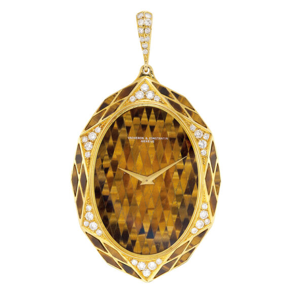 Swiss gold, diamond/tiger's eye set pendant watch Circa 1979