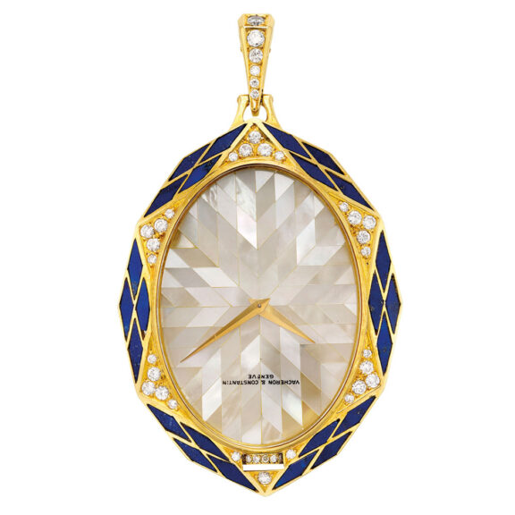 Swiss gold, diamond/lapis lazuli set pendant watch Circa 1981