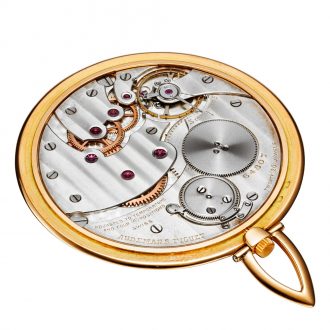 Ultra thin Swiss 18K rose gold open faced lever watch Circa 1956