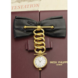 Swiss 18K gold pendant watch with brooch and chatelaine Circa 1994 Swiss 18K gold pendant watch with brooch and chatelaine Circa 1994