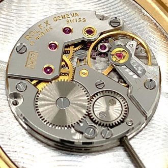 Elegant Swiss 18K gold open faced dress watch Circa 1975